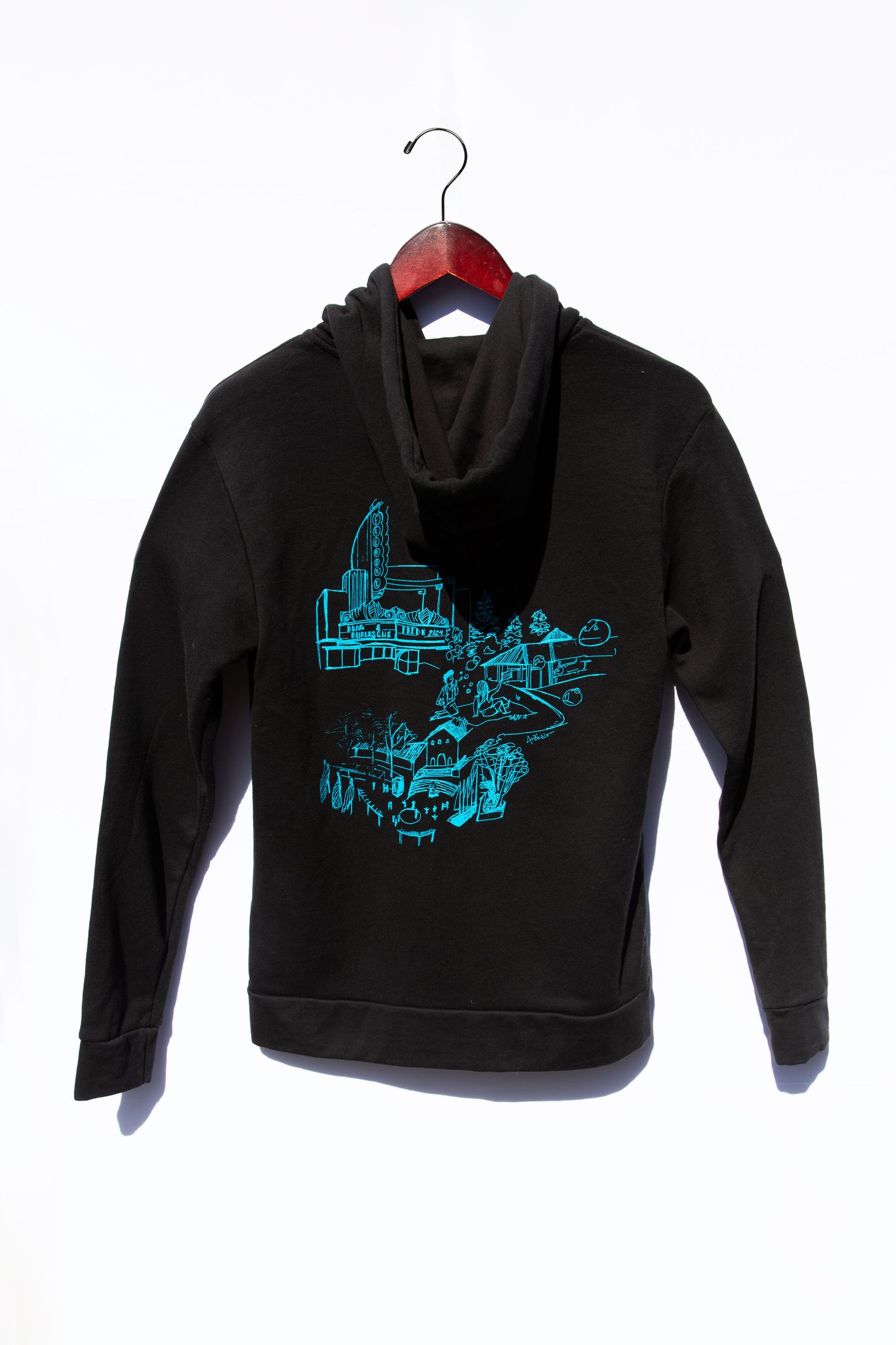 Black colored sweater with the backside showing a design of <PLACE>.